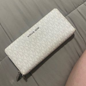 Grey and white MK wallet